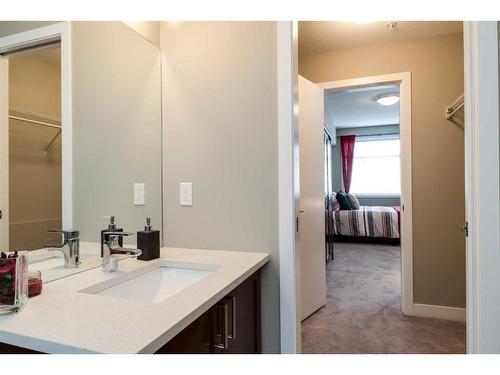 205-22 Auburn Bay Link Se, Calgary, AB - Indoor Photo Showing Bathroom