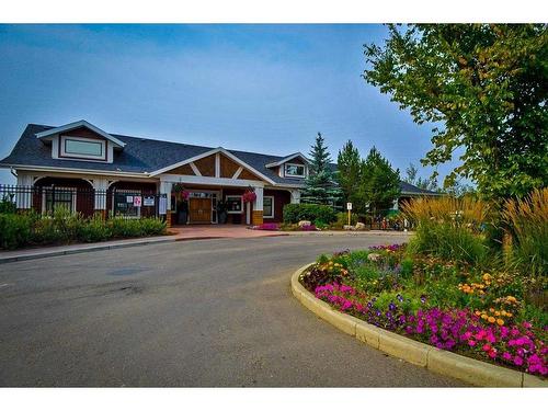 205-22 Auburn Bay Link Se, Calgary, AB - Outdoor With Facade