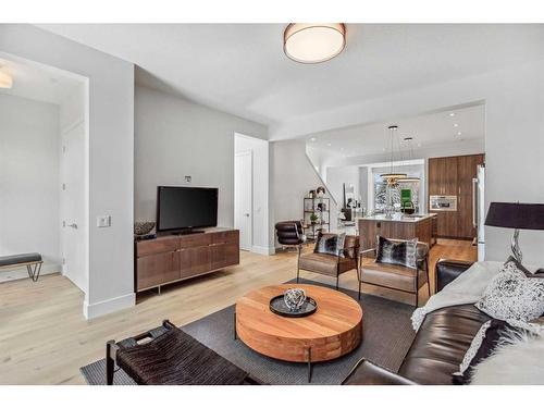 114 Valour Circle Sw, Calgary, AB - Indoor Photo Showing Living Room