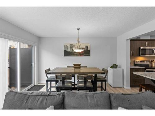 345 Hillcrest Square Sw, Airdrie, AB - Indoor Photo Showing Dining Room