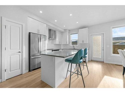 105-65 Belvedere Point Se, Calgary, AB - Indoor Photo Showing Kitchen With Stainless Steel Kitchen With Upgraded Kitchen