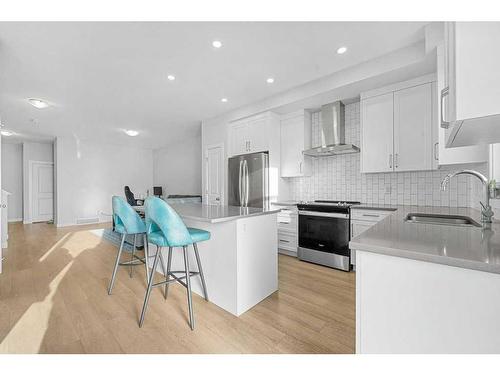 105-65 Belvedere Point Se, Calgary, AB - Indoor Photo Showing Kitchen With Stainless Steel Kitchen With Upgraded Kitchen