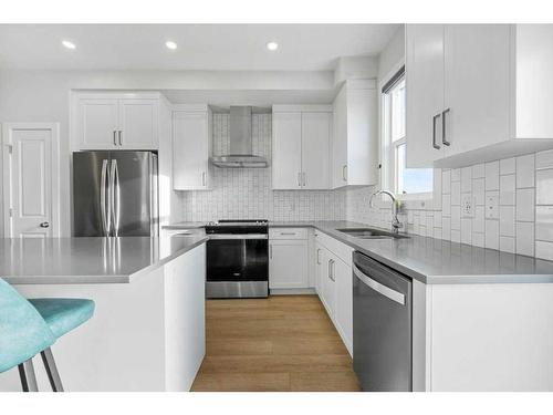 105-65 Belvedere Point Se, Calgary, AB - Indoor Photo Showing Kitchen With Stainless Steel Kitchen With Upgraded Kitchen