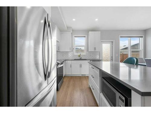 105-65 Belvedere Point Se, Calgary, AB - Indoor Photo Showing Kitchen With Stainless Steel Kitchen With Upgraded Kitchen