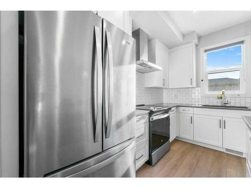 105-65 Belvedere Point Se, Calgary, AB - Indoor Photo Showing Kitchen With Stainless Steel Kitchen With Upgraded Kitchen