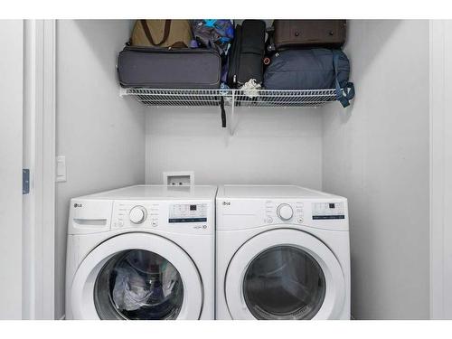 105-65 Belvedere Point Se, Calgary, AB - Indoor Photo Showing Laundry Room