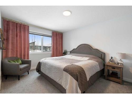 14 Wolf Creek Manor Se, Calgary, AB - Indoor Photo Showing Bedroom