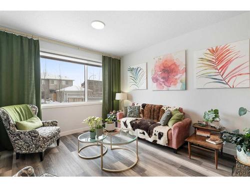 14 Wolf Creek Manor Se, Calgary, AB - Indoor Photo Showing Living Room