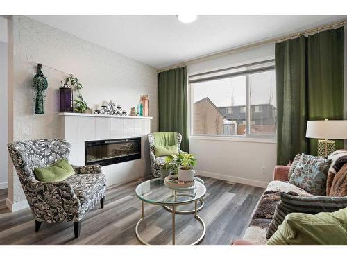 14 Wolf Creek Manor Se, Calgary, AB - Indoor Photo Showing Living Room With Fireplace