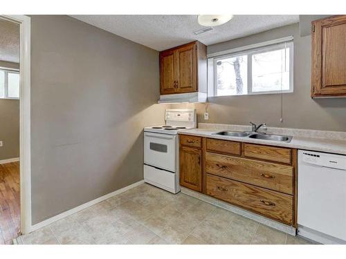 2435 23 Street Nw, Calgary, AB - Indoor Photo Showing Kitchen With Double Sink