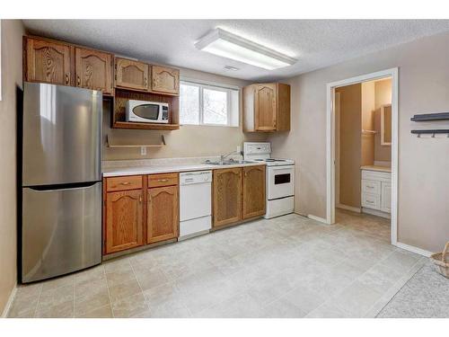 2435 23 Street Nw, Calgary, AB - Indoor Photo Showing Kitchen With Double Sink