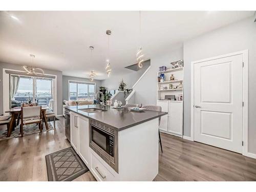 968 Seton Circle Se, Calgary, AB - Indoor Photo Showing Kitchen With Double Sink