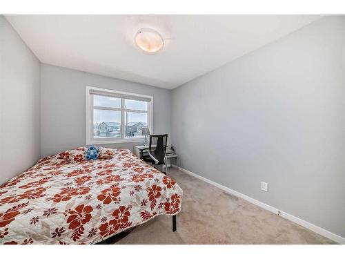 968 Seton Circle Se, Calgary, AB - Indoor Photo Showing Bedroom