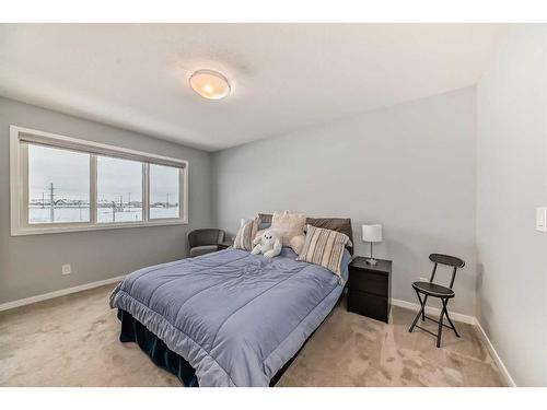 968 Seton Circle Se, Calgary, AB - Indoor Photo Showing Bedroom