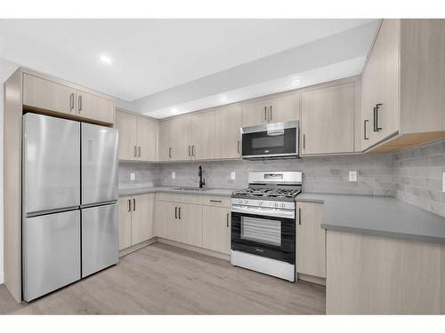 2419 37 Street Sw, Calgary, AB - Indoor Photo Showing Kitchen With Stainless Steel Kitchen