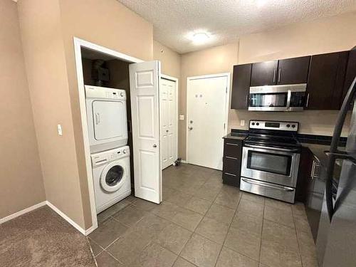 1208-325 3 Street Se, Calgary, AB - Indoor Photo Showing Laundry Room