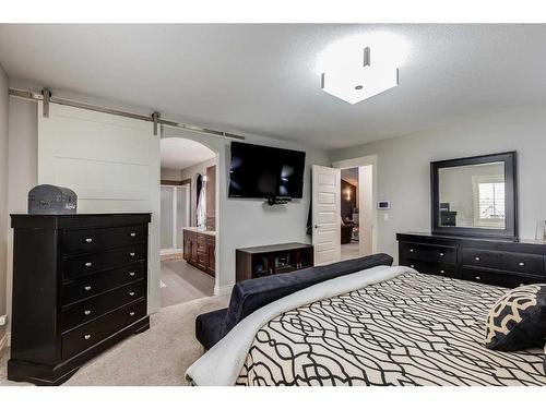 1093 Coopers Drive Sw, Airdrie, AB - Indoor Photo Showing Bedroom