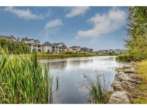 1093 Coopers Drive Sw, Airdrie, AB - Outdoor With Body Of Water With View