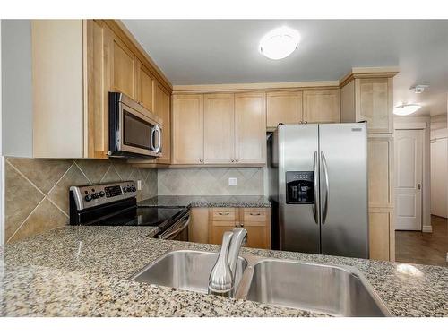 1503-836 15 Avenue Sw, Calgary, AB - Indoor Photo Showing Kitchen With Stainless Steel Kitchen With Double Sink With Upgraded Kitchen