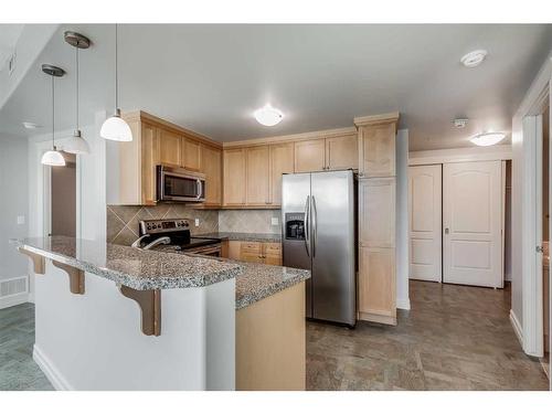 1503-836 15 Avenue Sw, Calgary, AB - Indoor Photo Showing Kitchen With Stainless Steel Kitchen With Upgraded Kitchen