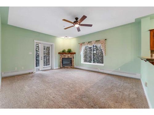 438-20 Discovery Ridge Close Sw, Calgary, AB - Indoor Photo Showing Living Room