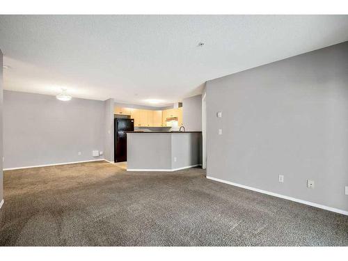 2221-10 Prestwick Bay Se, Calgary, AB - Indoor Photo Showing Other Room