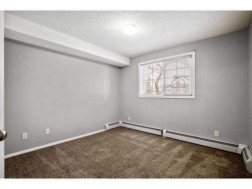 2221-10 Prestwick Bay Se, Calgary, AB - Indoor Photo Showing Other Room