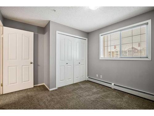 2221-10 Prestwick Bay Se, Calgary, AB - Indoor Photo Showing Other Room