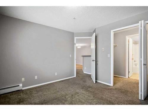 2221-10 Prestwick Bay Se, Calgary, AB - Indoor Photo Showing Other Room