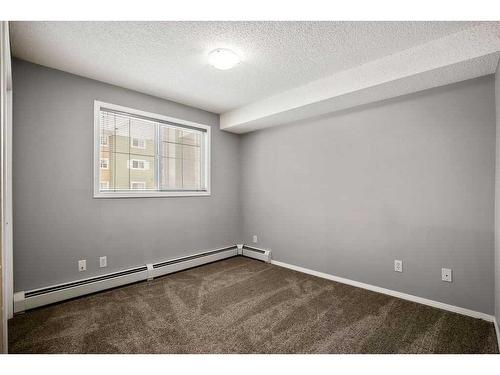 2221-10 Prestwick Bay Se, Calgary, AB - Indoor Photo Showing Other Room