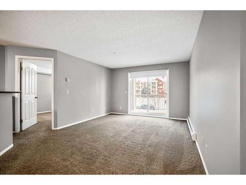 2221-10 Prestwick Bay Se, Calgary, AB - Indoor Photo Showing Other Room