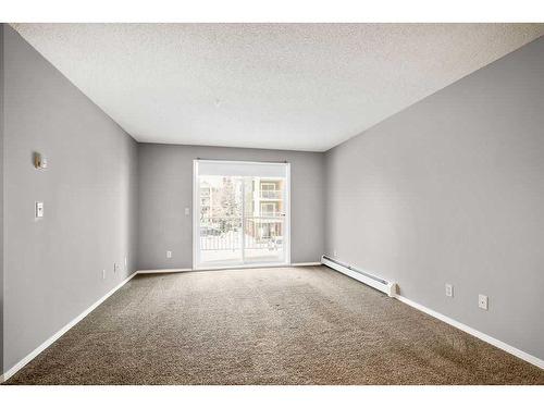 2221-10 Prestwick Bay Se, Calgary, AB - Indoor Photo Showing Other Room