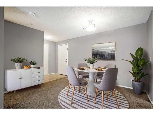 2221-10 Prestwick Bay Se, Calgary, AB - Indoor Photo Showing Dining Room