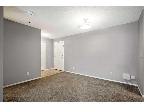 2221-10 Prestwick Bay Se, Calgary, AB - Indoor Photo Showing Other Room