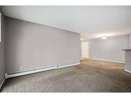 2221-10 Prestwick Bay Se, Calgary, AB - Indoor Photo Showing Other Room