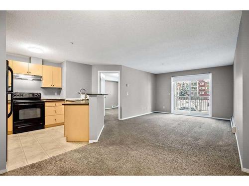 2221-10 Prestwick Bay Se, Calgary, AB - Indoor Photo Showing Kitchen