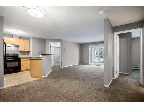 2221-10 Prestwick Bay Se, Calgary, AB - Indoor Photo Showing Kitchen