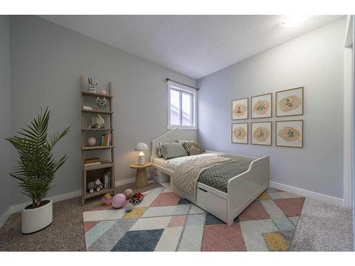 50 Martindale Drive Ne, Calgary, AB - Indoor Photo Showing Bedroom