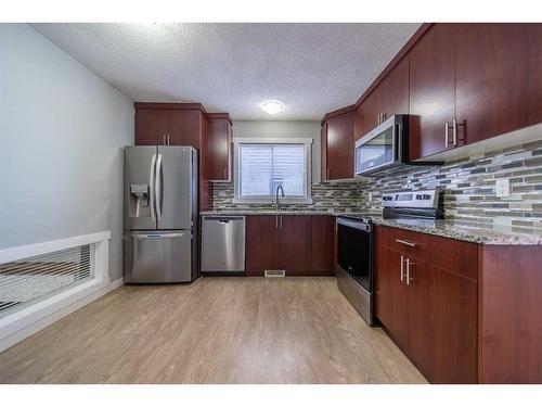 50 Martindale Drive Ne, Calgary, AB - Indoor Photo Showing Kitchen