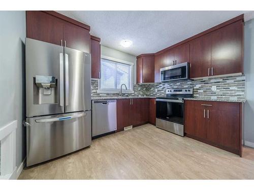 50 Martindale Drive Ne, Calgary, AB - Indoor Photo Showing Kitchen