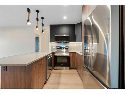 1712 Edenwold Heights Nw, Calgary, AB - Indoor Photo Showing Kitchen With Stainless Steel Kitchen With Upgraded Kitchen