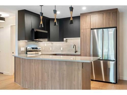 1712 Edenwold Heights Nw, Calgary, AB - Indoor Photo Showing Kitchen With Stainless Steel Kitchen With Upgraded Kitchen