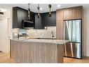 1712 Edenwold Heights Nw, Calgary, AB  - Indoor Photo Showing Kitchen With Stainless Steel Kitchen With Upgraded Kitchen 