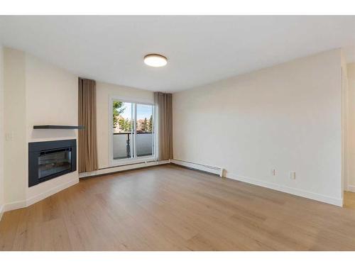 1712 Edenwold Heights Nw, Calgary, AB - Indoor With Fireplace