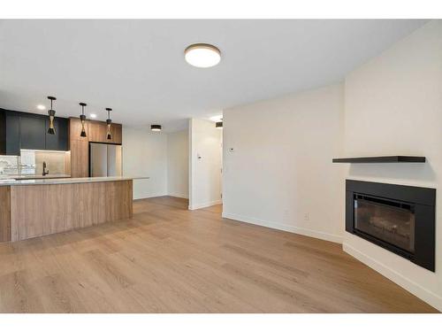 1712 Edenwold Heights Nw, Calgary, AB - Indoor With Fireplace