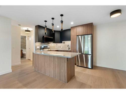 1712 Edenwold Heights Nw, Calgary, AB - Indoor Photo Showing Kitchen With Stainless Steel Kitchen With Upgraded Kitchen