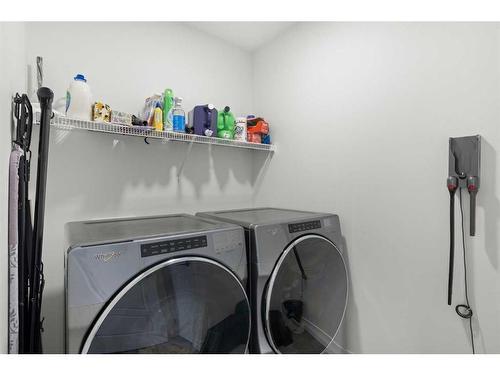 294 Seton Villas Se, Calgary, AB - Indoor Photo Showing Laundry Room