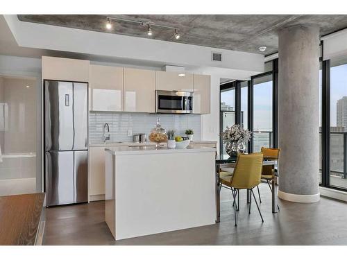 1202-1010 6 Street Sw, Calgary, AB - Indoor Photo Showing Kitchen With Upgraded Kitchen