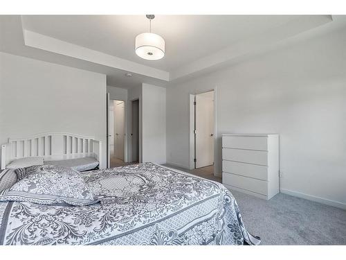 53 Copperhead Road Se, Calgary, AB - Indoor Photo Showing Bedroom