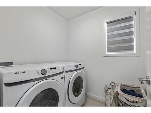 53 Copperhead Road Se, Calgary, AB - Indoor Photo Showing Laundry Room